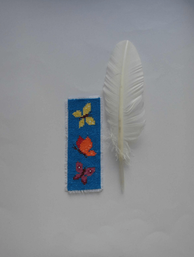 Les papillons virevoltant du marque-page